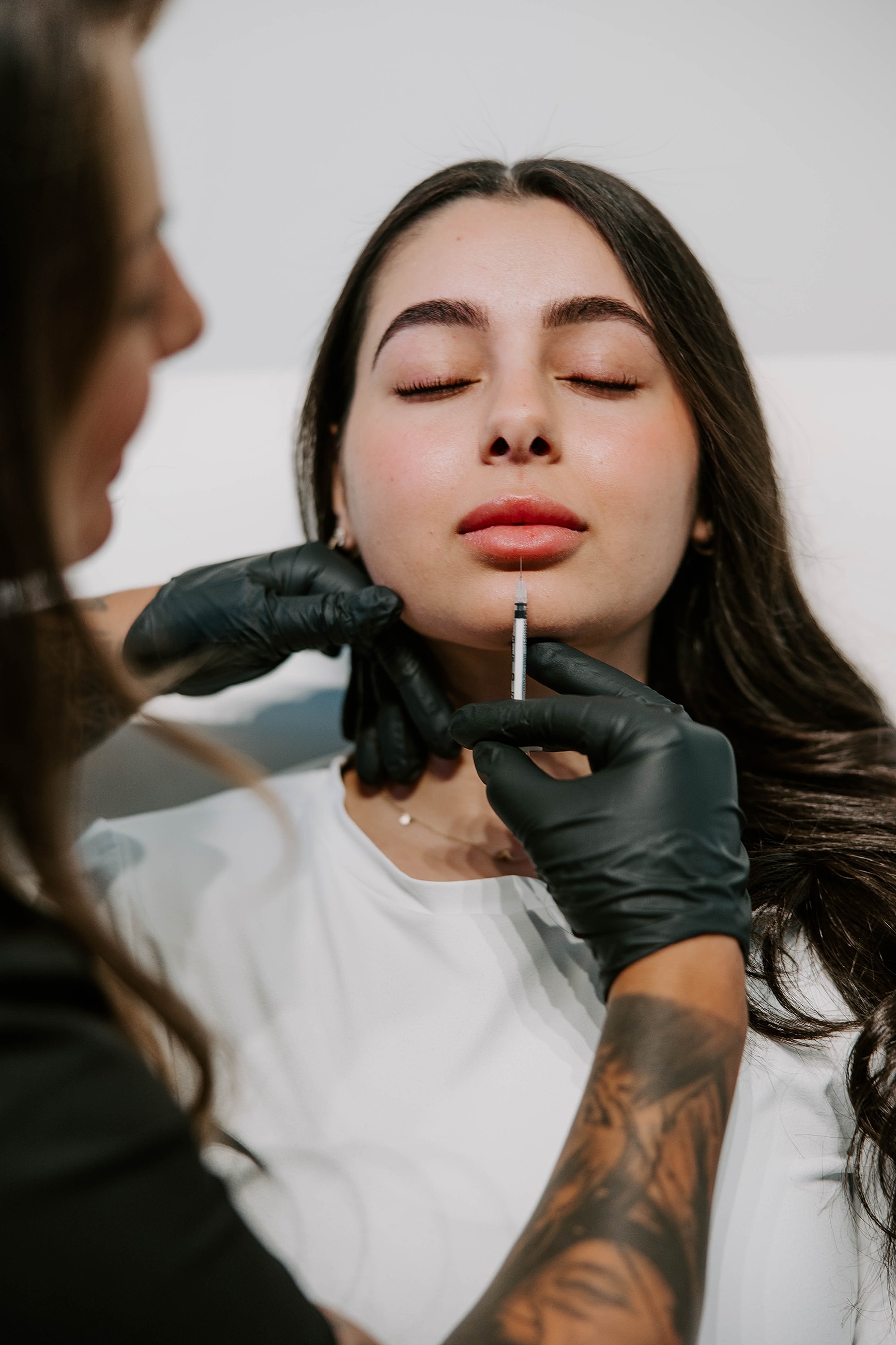 Lip injection procedure in a cosmetic clinic.